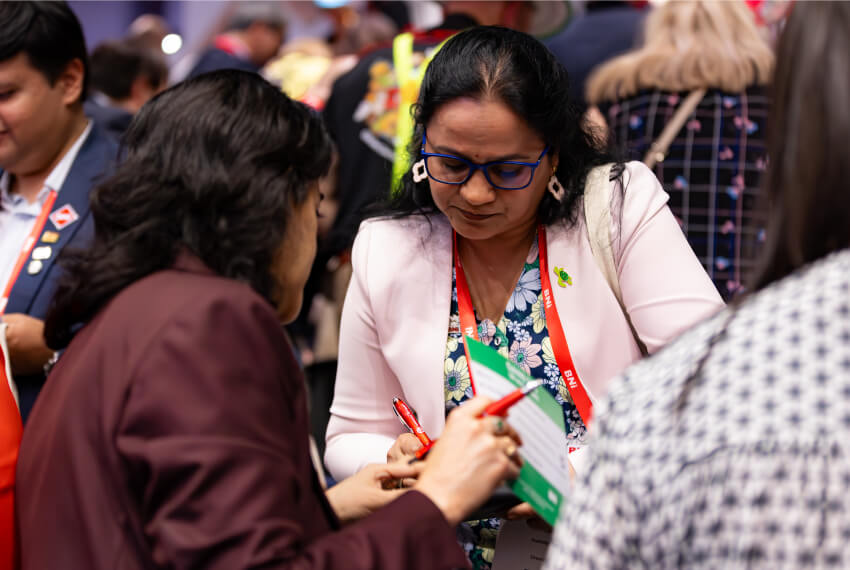 Business networking event with professionals connecting personally