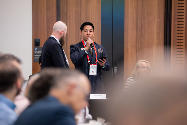 Business leader presenting at a professional networking conference